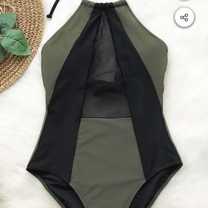 New with tags- green and black one piece